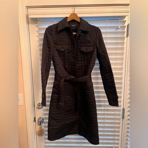 Black quilted Express coat with belt